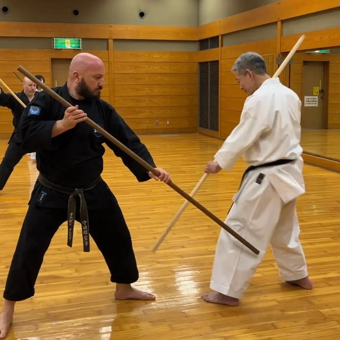 Olgun Tiltay in Nagoya Japan practicing traditional weapons with  Hideki Yamada Sensei [9th Dan Shorin-Ryu Karate]